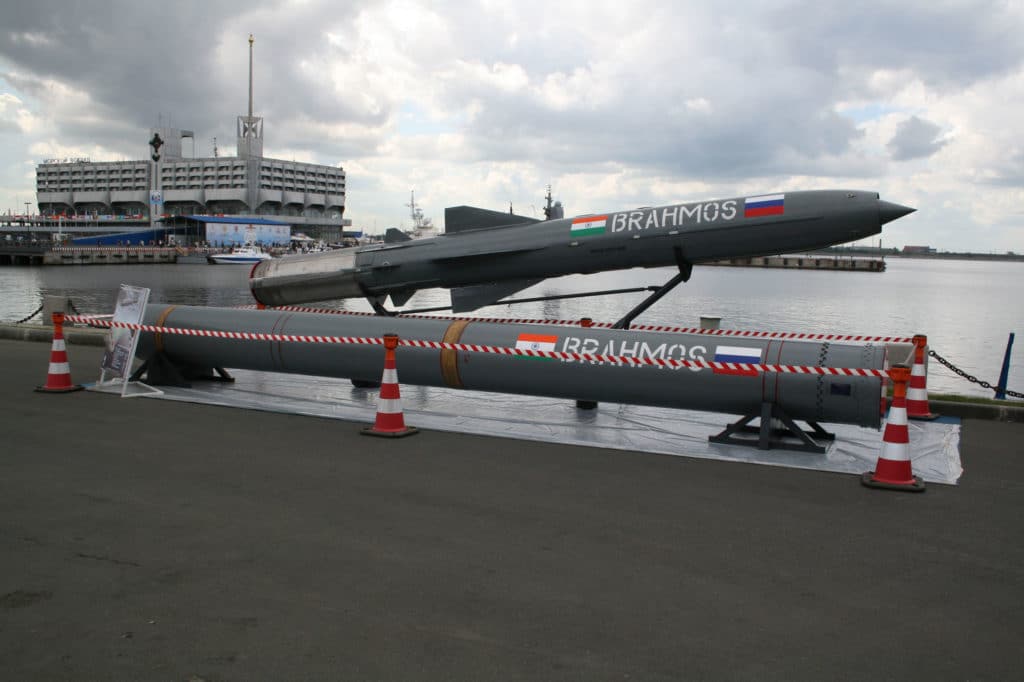 Two model BrahMos missiles on display.